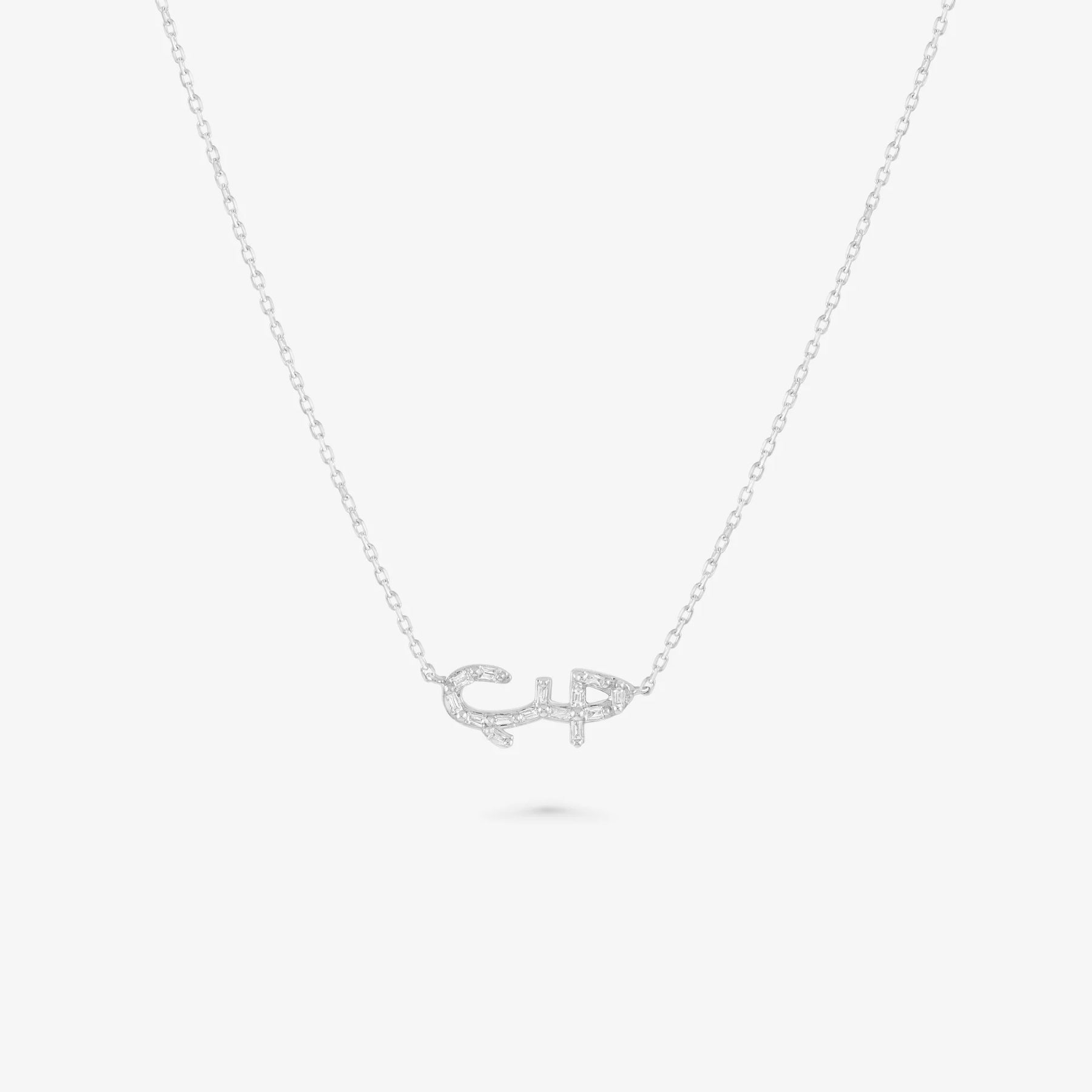 HOBB — 18K Gold Baguette Diamond “Love” Pendant