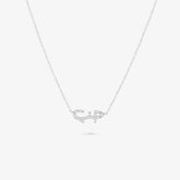 HOBB — 18K Gold Baguette Diamond “Love” Pendant